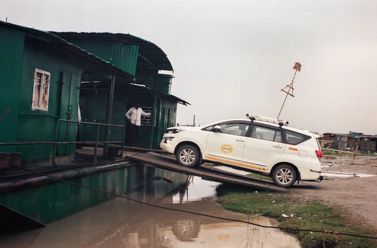 Seems dangerous, but it works. Embarking the ferry across the Brahmaputra River.