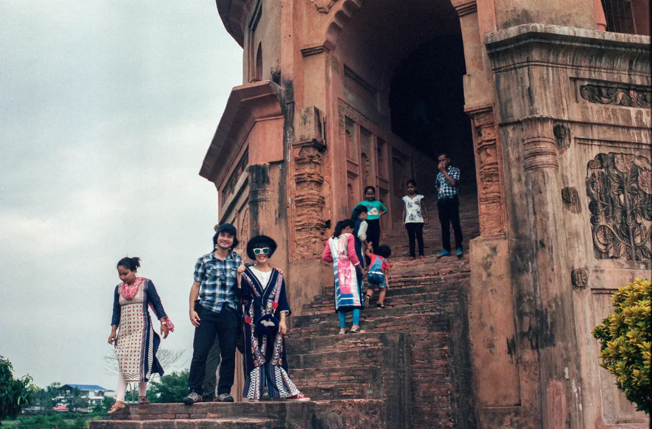 Suphy and I on the stairs to Rang Ghar's top floor