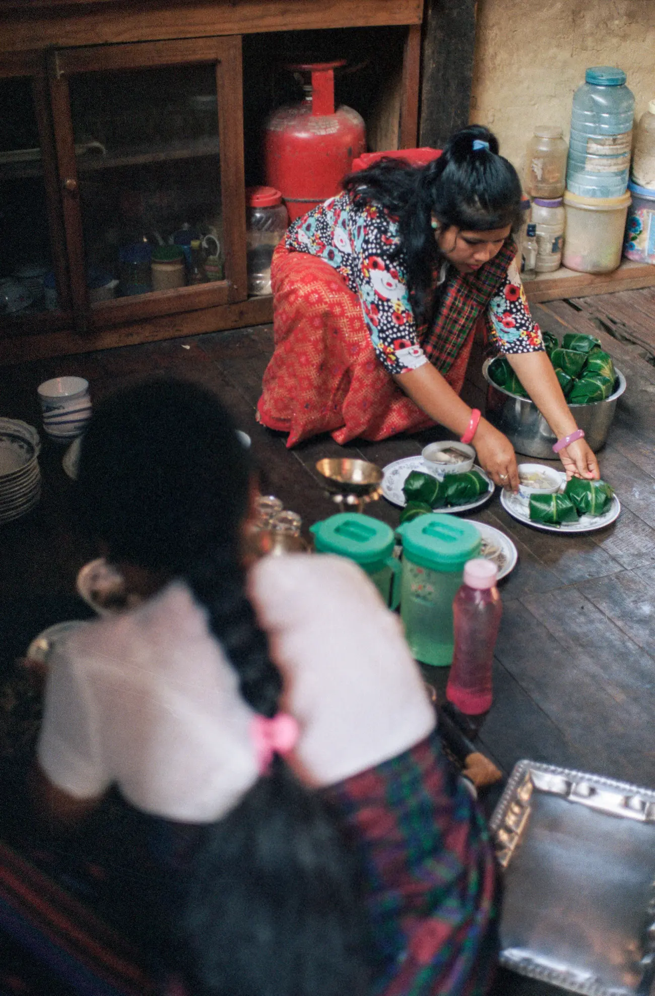 Singpho village locals prepare a meal for us