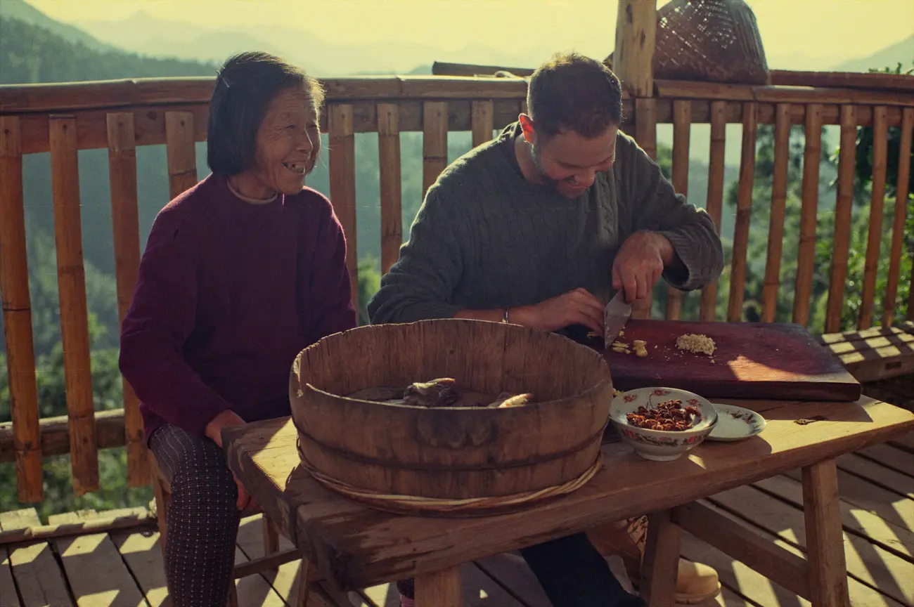 Our host Jamie learns to cook 'stinky mandarin fish' from Hong-nainai.