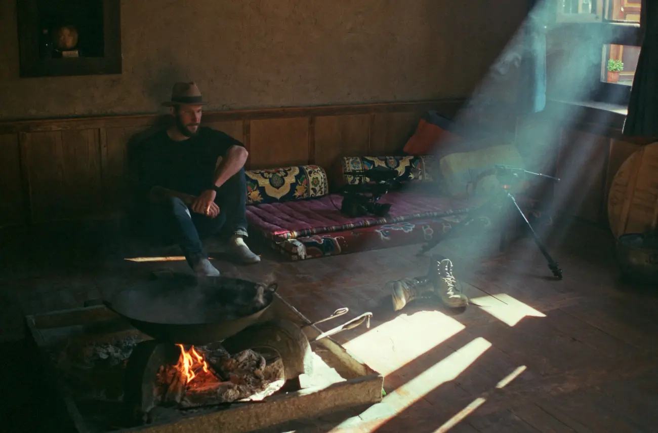 Chad, the cinematographer, admires the light in Gemachu nainai's home.