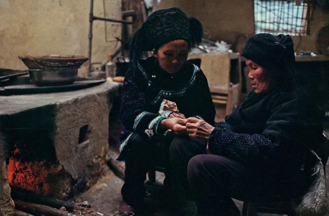 Meng-nainai and daughter enjoy Whittaker's chocolate from NZ.