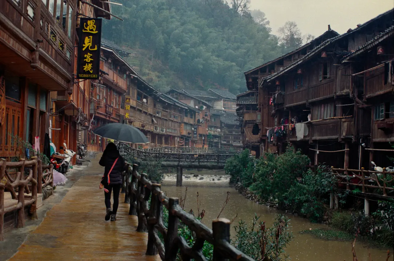 Zhaoxing Dong Village is built around a river valley.