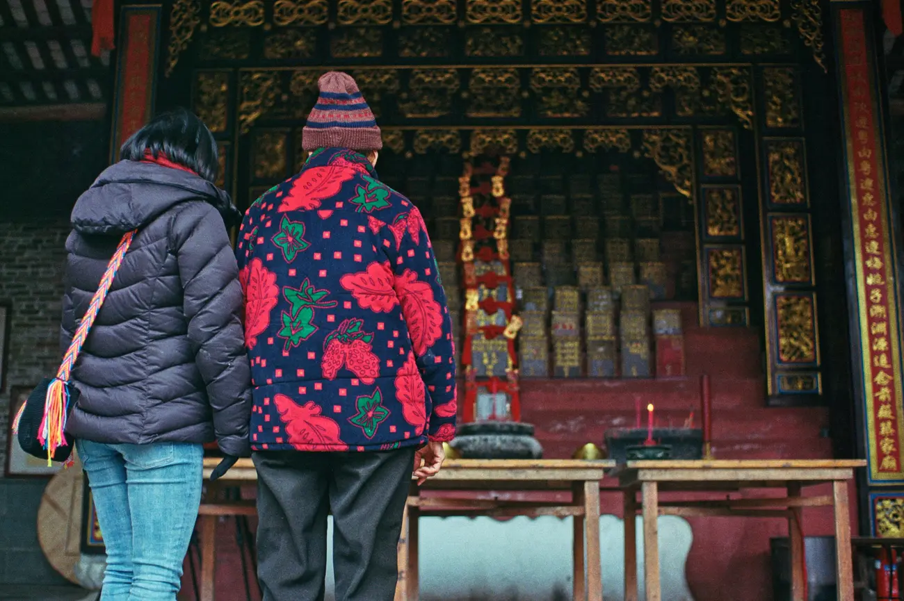 Guo-nainai shows us her family's ancestral hall.