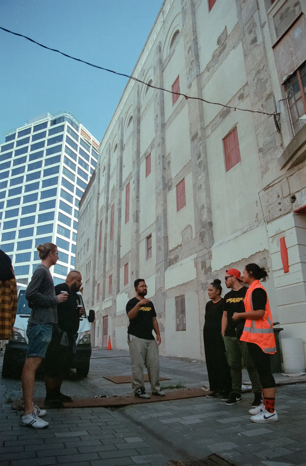 Post-lunch briefing at the St. James Theatre. Yes, that's more or less the whole crew. | Fuji Superia 400